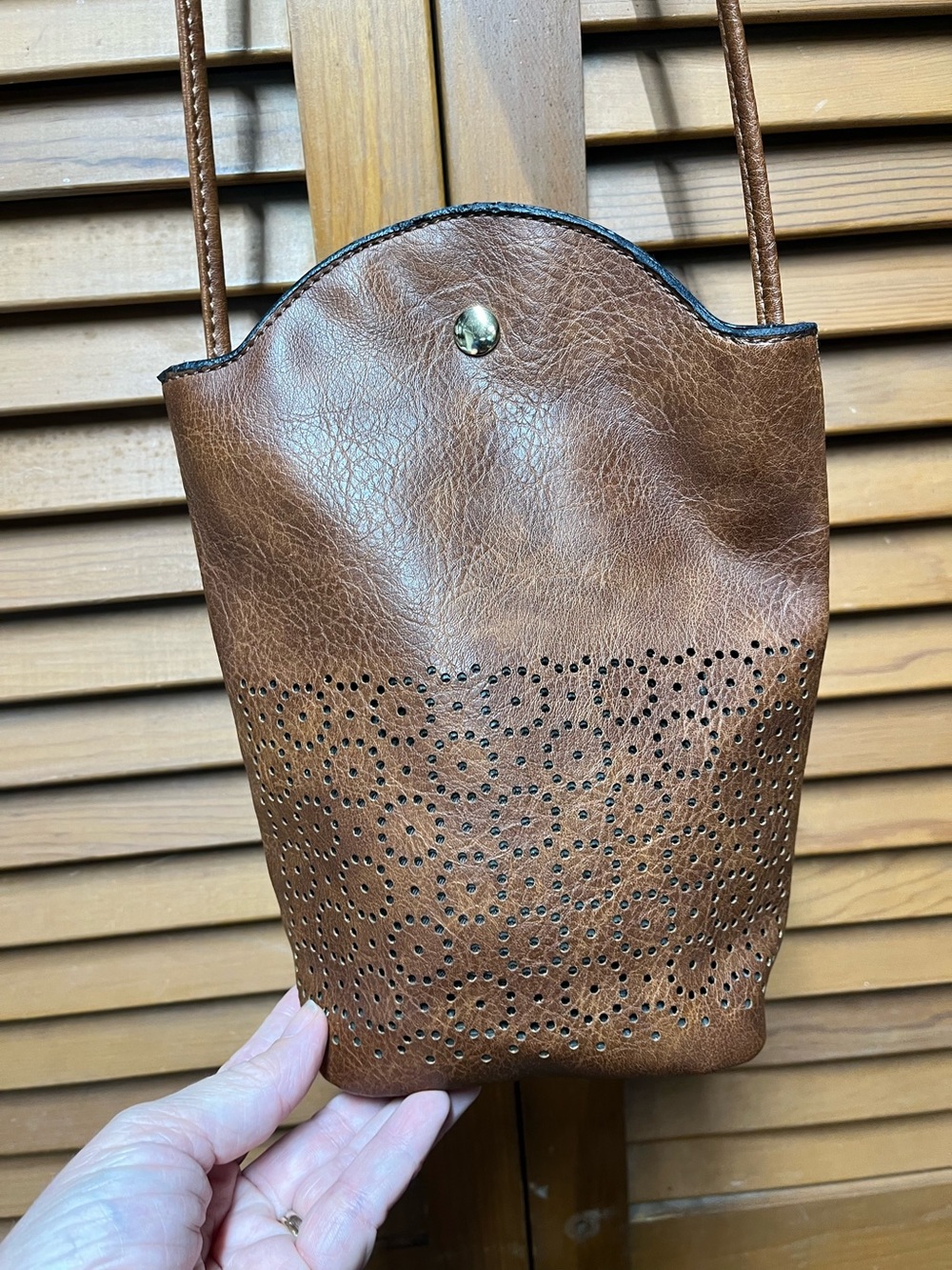Brenice Cognac Brown Laser Cut Eyelet Vegan Leather Crossbody Phone Bag Pouch
